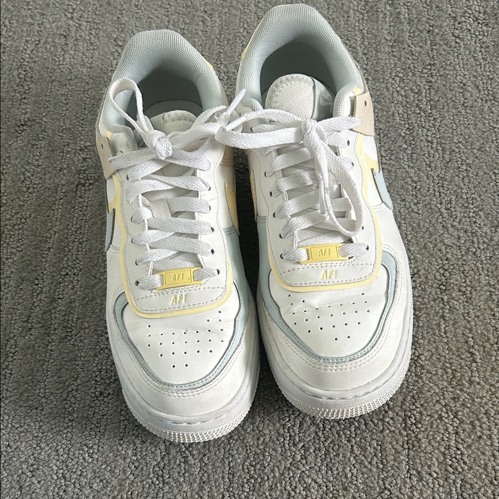 White AF1s with Pale Yellow and Light Blue Accents
